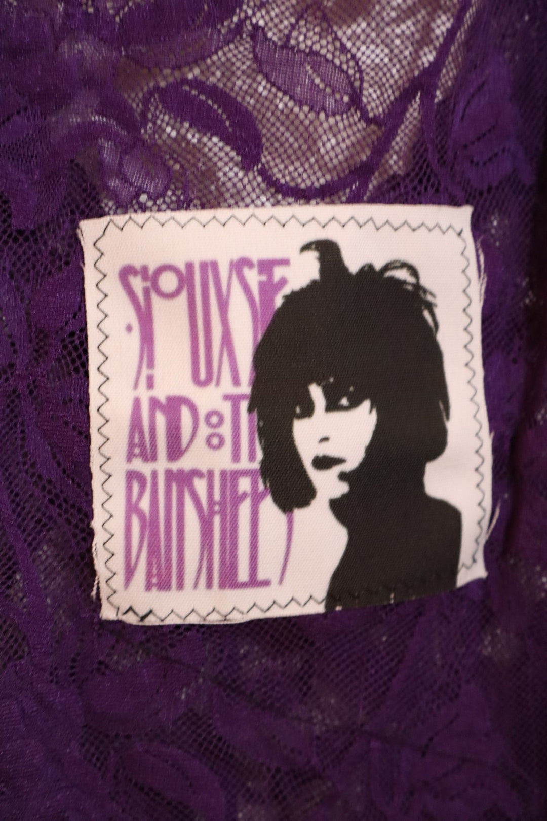 Purple Siouxe and the Banshees lace top