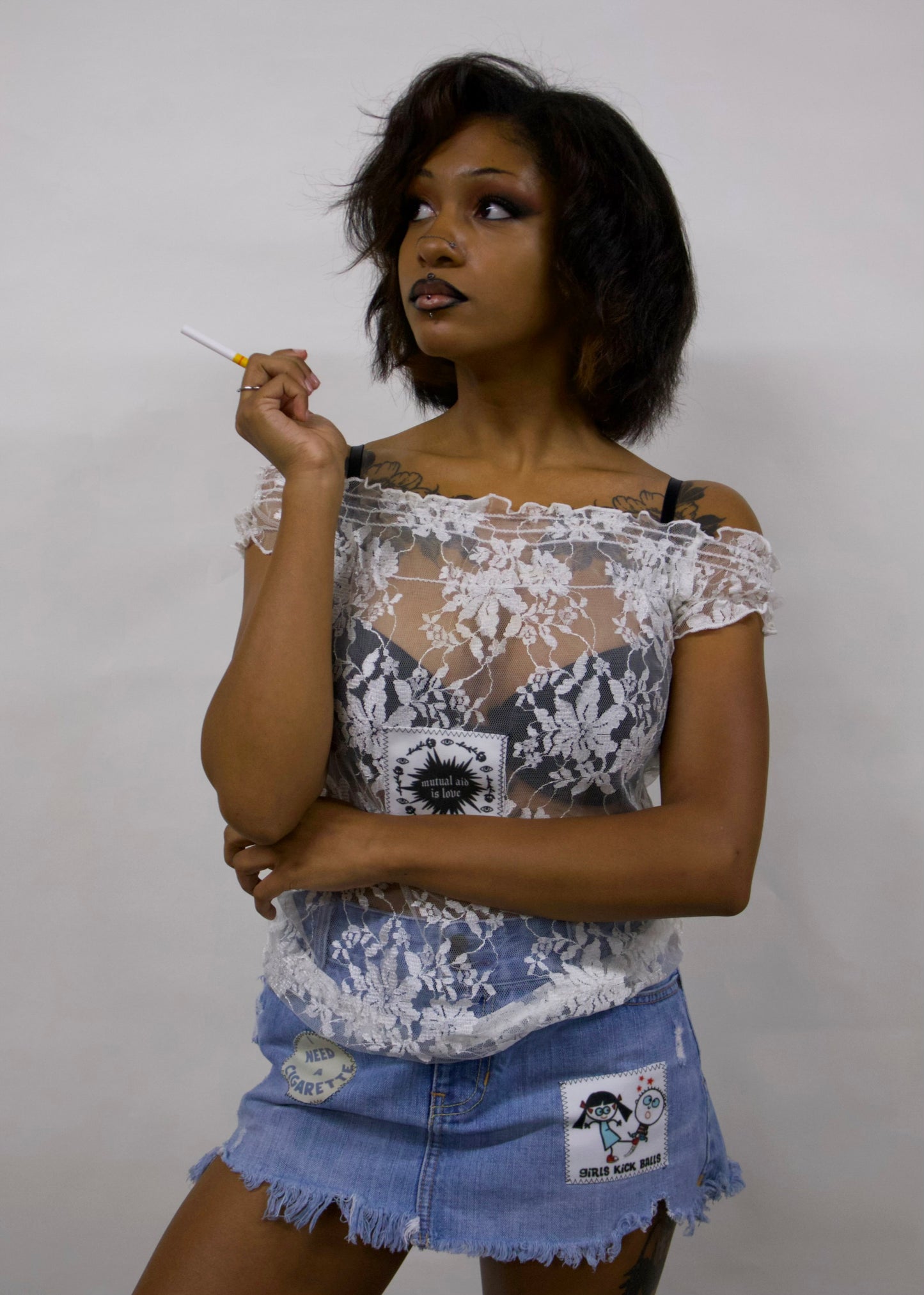 Mutual aid is love white lace top